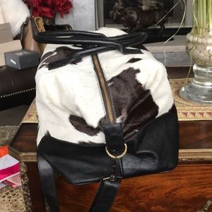 Natural cowhide handbag